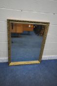 A RECTANGULAR GILT FRAMED BEVELLED EDGE WALL MIRROR, 114cm x 87cm (condition report: some small