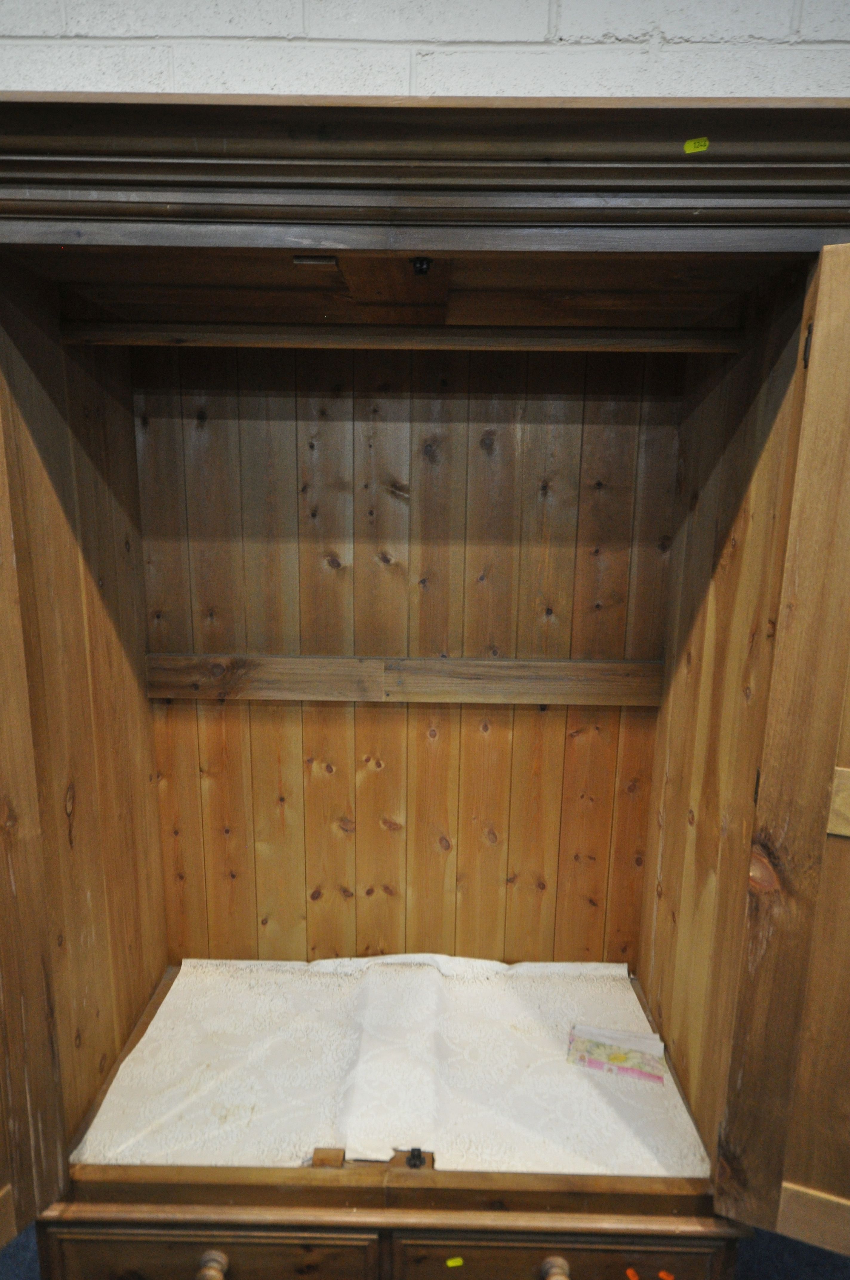 A PINE DOUBLE DOOR WARDROBE, with three drawers, width 130cm x depth 64cm x height 204cm ( - Image 2 of 4