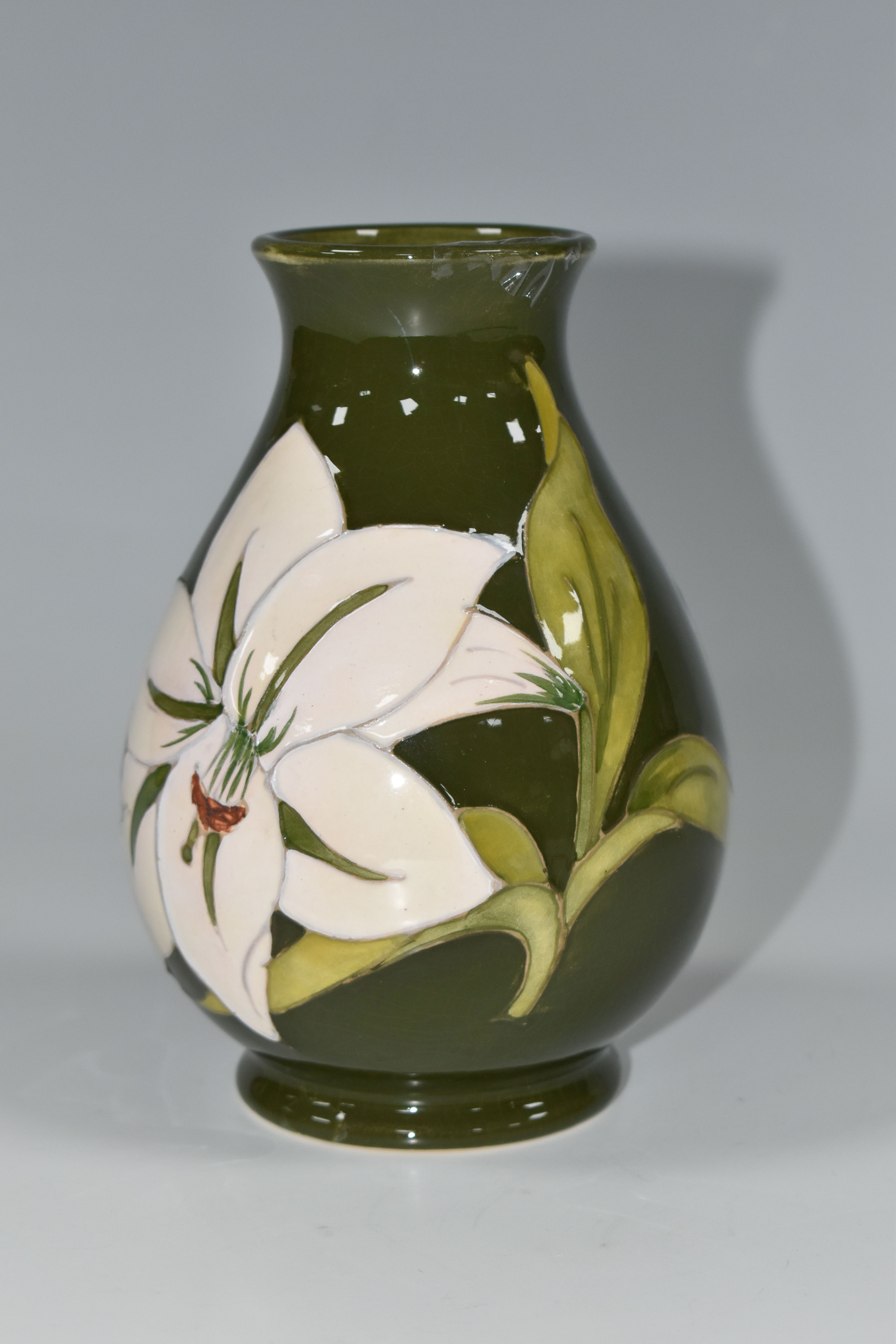 A MOORCROFT POTTERY 'BERMUDA LILY' PATTERN BALUSTER VASE, tube lined with white lilies on a green - Image 2 of 5