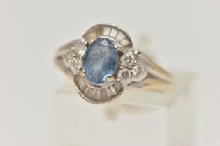A WHITE METAL SAPPHIRE AND DIAMOND RING, set with an oval cut sapphire, measuring approximately 7.