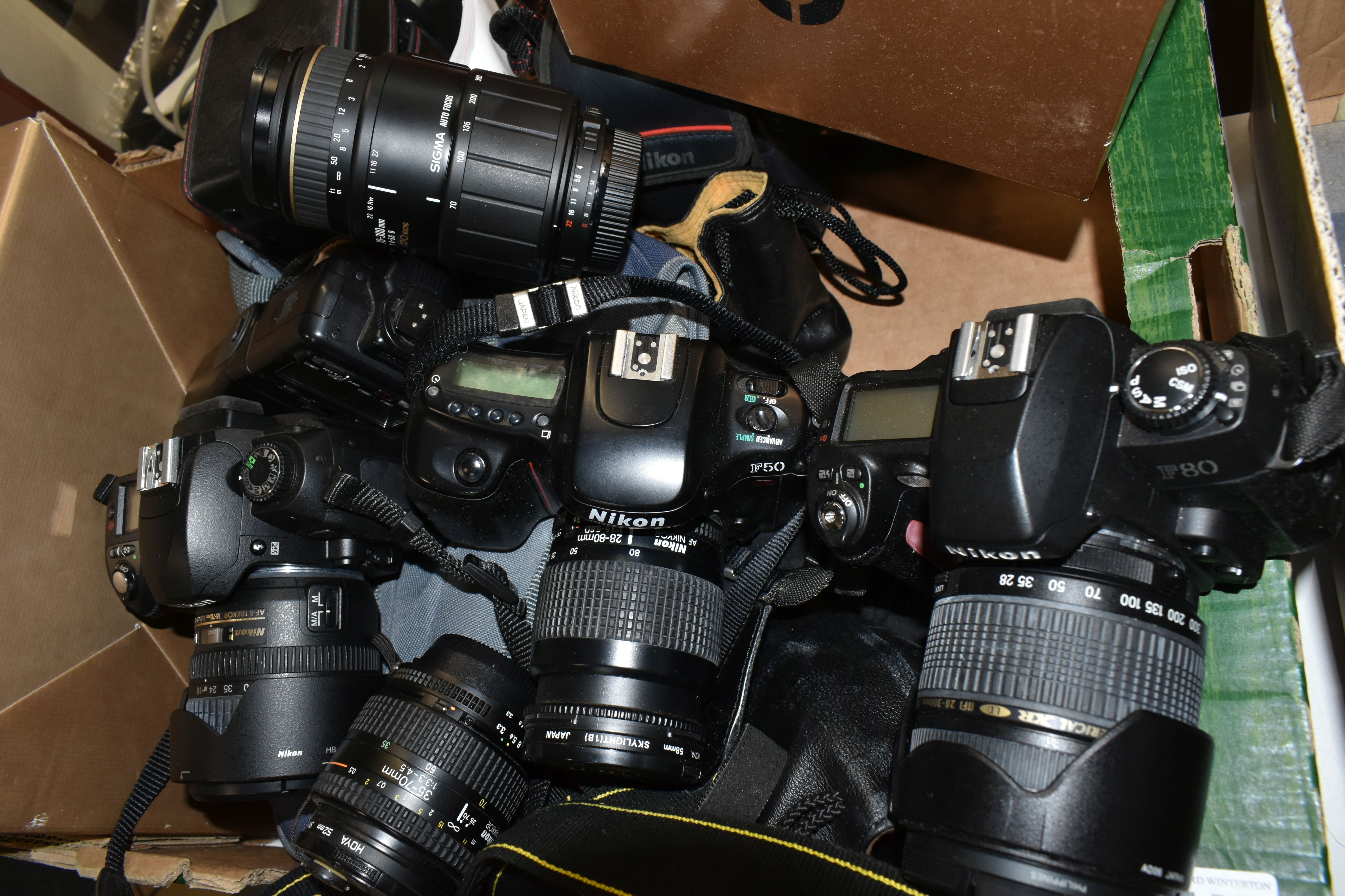 A BOX OF NIKON CAMERAS AND LENSES, to include a Nikon F80 35mm camera fitted with a Tamron f3.5-6. - Image 3 of 3
