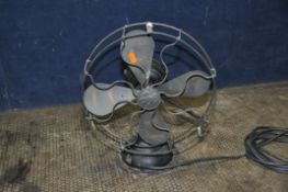 AN EARLY 20th CENTURY G.E.C. MAGNET TABLE FAN with copper blades and blade cover, modern mains cable