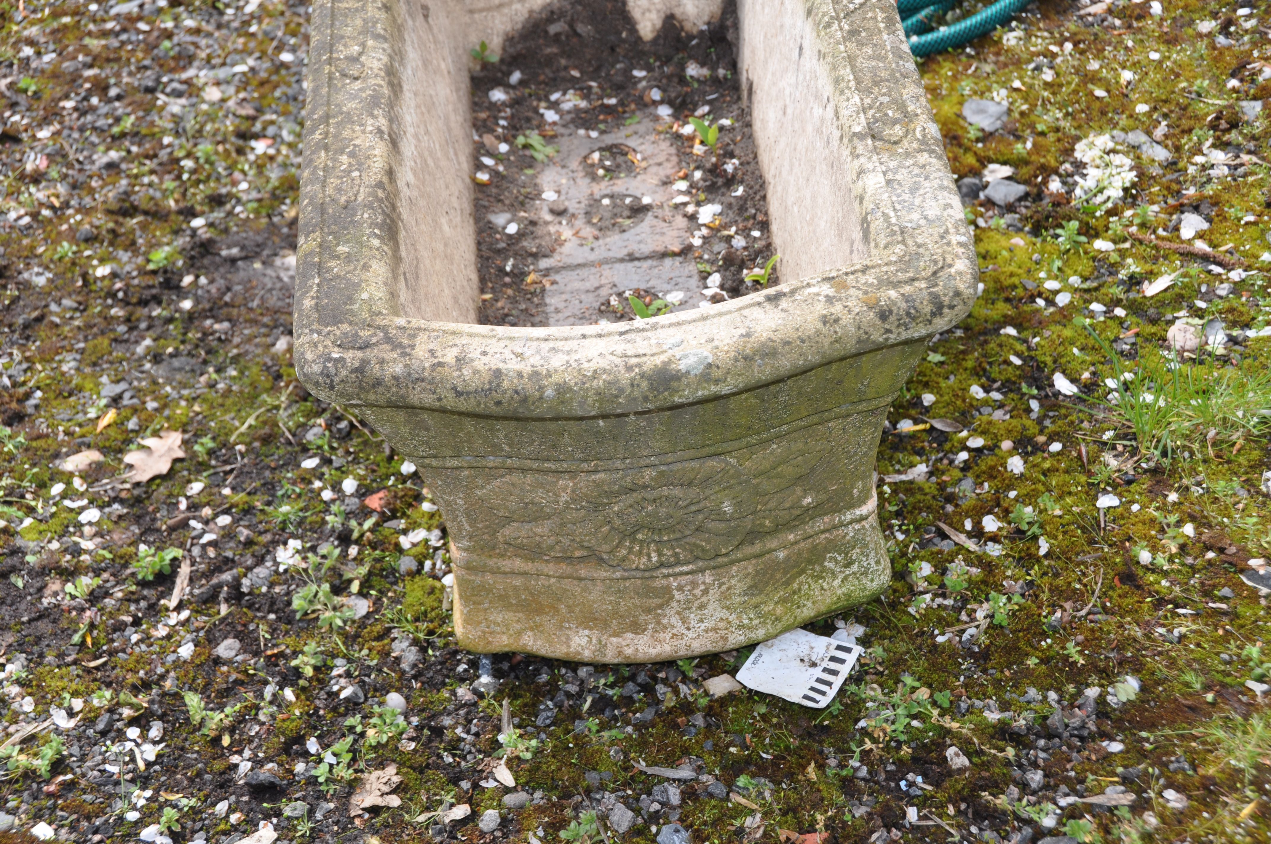 A WEATHERED COMPOSITE GARDEN PLANTER rectangular with flared sides and floral detail length 63cm - Image 2 of 2