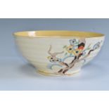 A CLARICE CLIFF 'TIGER TREES' PATTERN BOWL, the ribbed bowl painted with the stylised trees on a