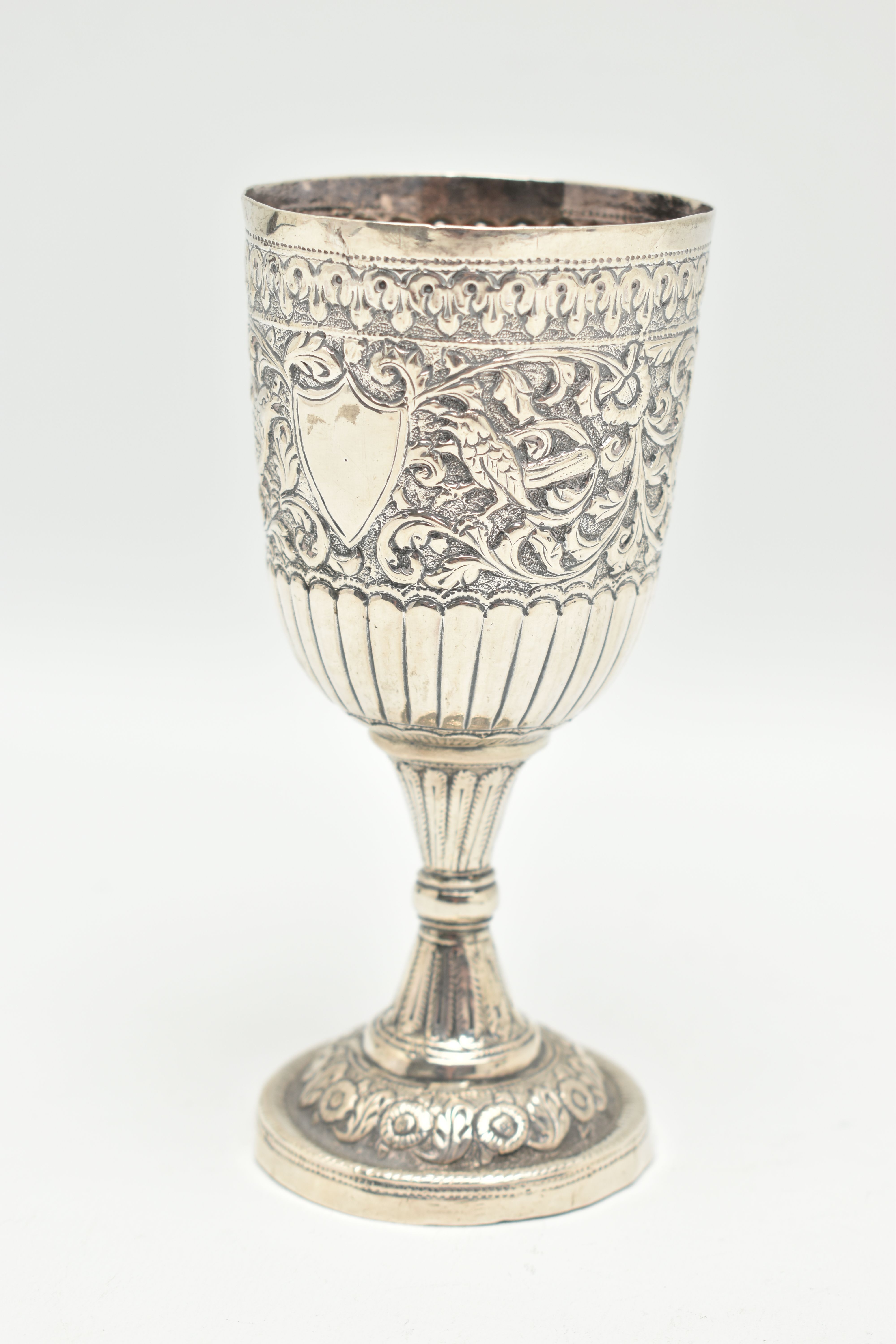 A LATE 19TH CENTURY INDIAN WHITE METAL GOBLET, repoussé decorated with foliate scrolls and birds, - Image 4 of 6