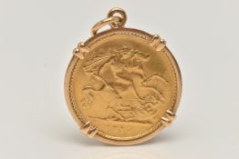 AN EARLY 20TH CENTURY HALF SOVEREIGN PENDANT, half sovereign dated 1917, within a yellow metal