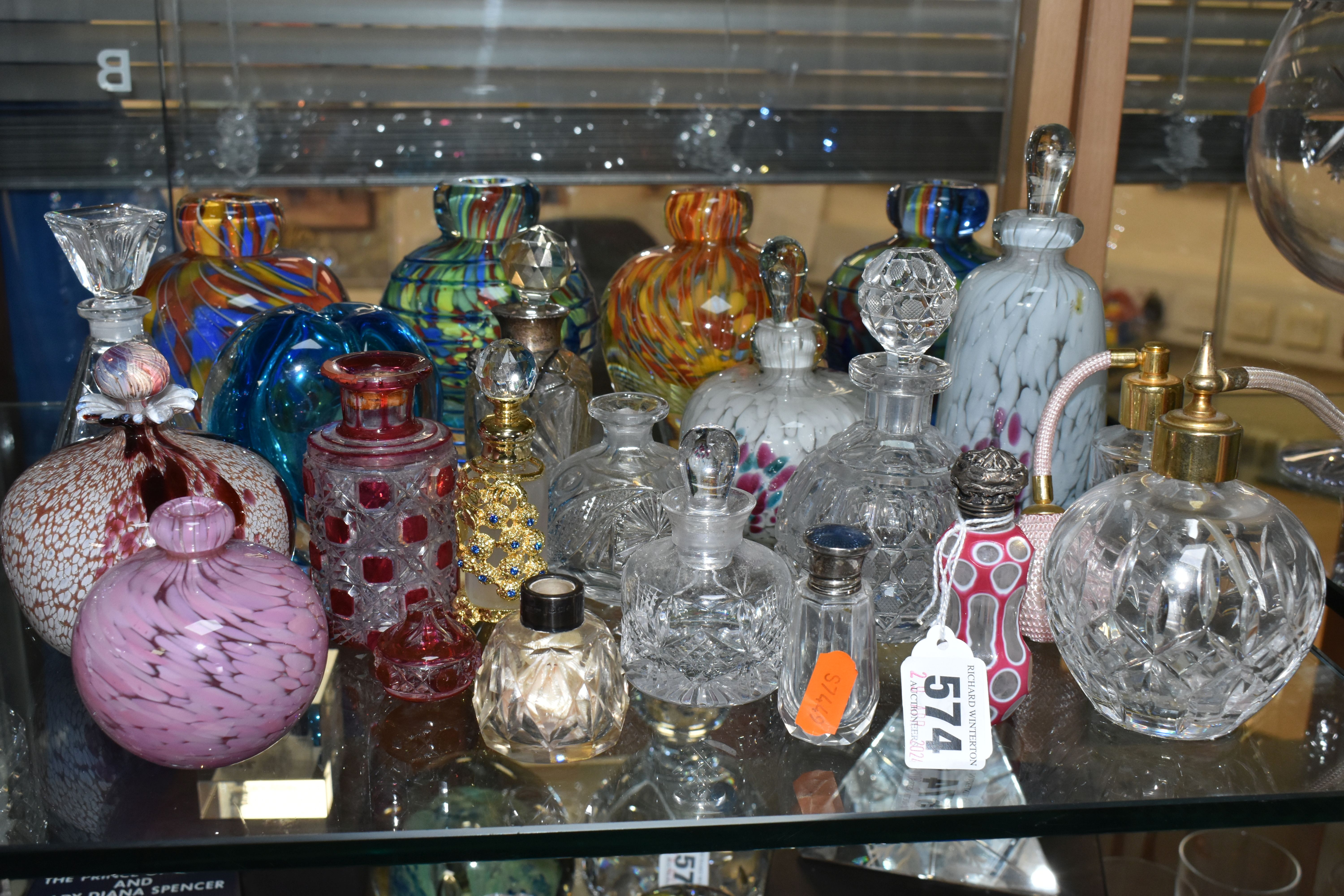 A GROUP OF SCENT BOTTLES, twenty one examples to include a pink and white overlay cut to clear scent