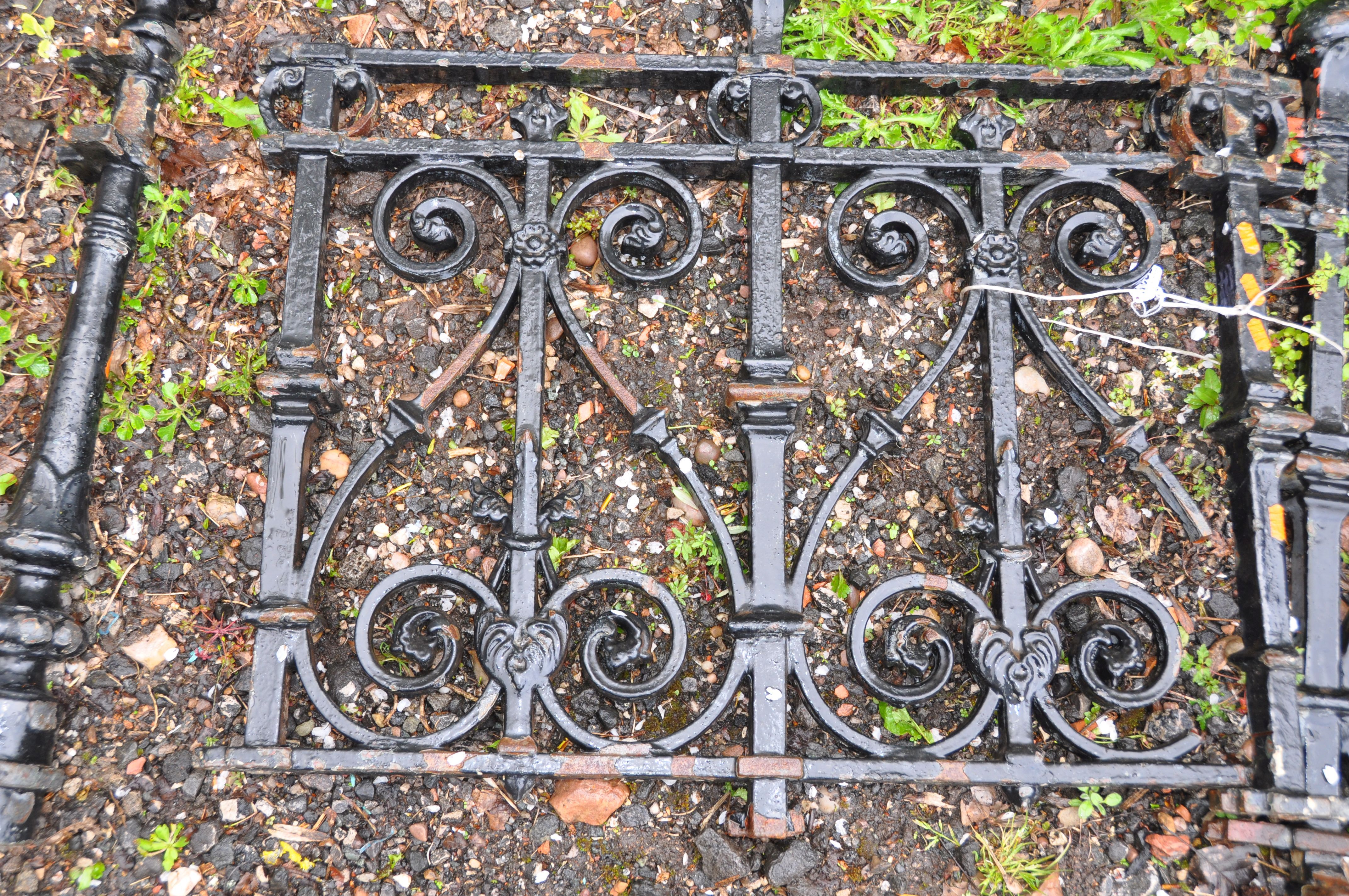 A VICTORIAN CAST IRON BALUSTRADE in two sections with two posts height 70cm length approx. 140cm ( - Image 2 of 2