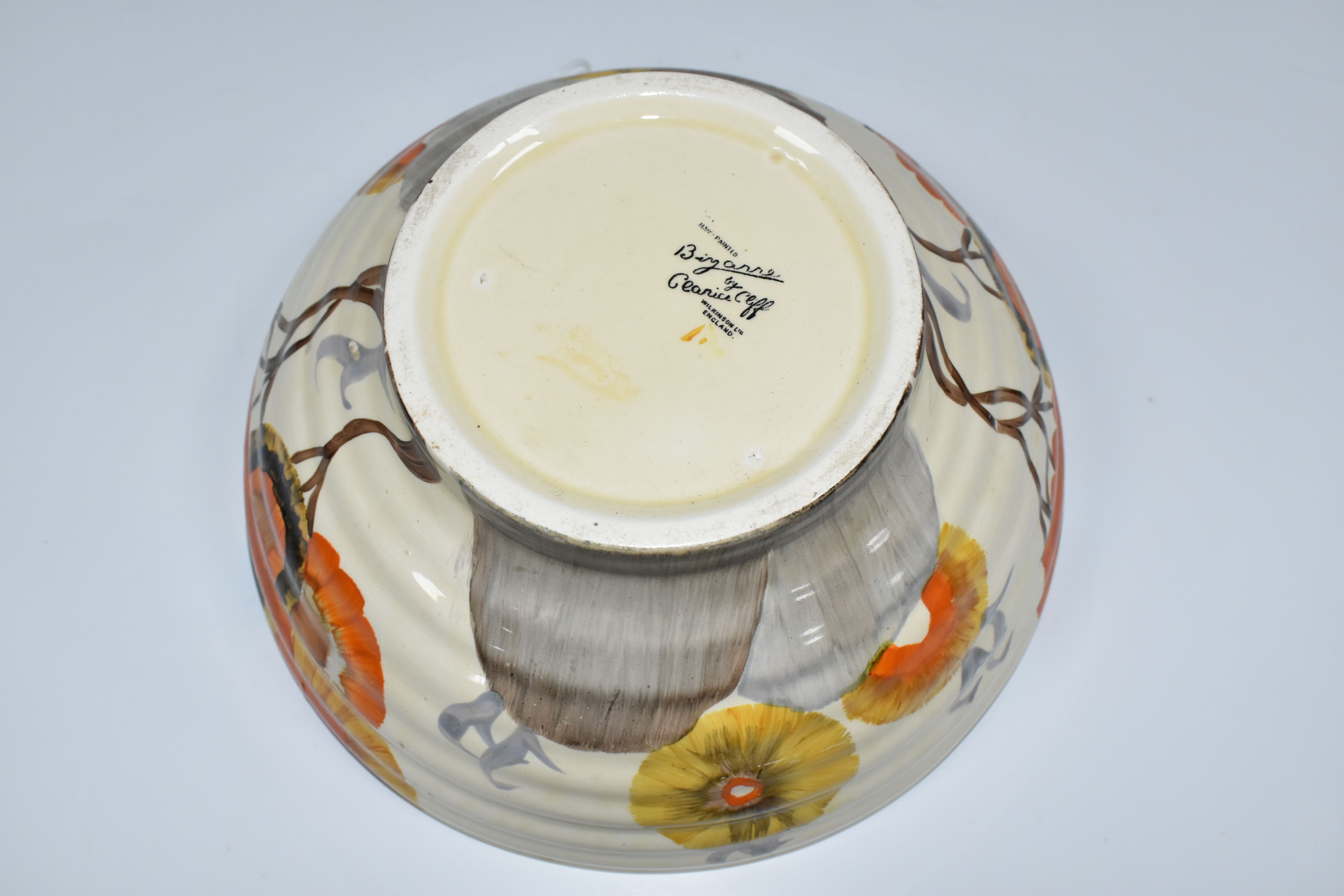 A CLARICE CLIFF BIZARRE BOWL, in Rhodanthe pattern, the ribbed bowl painted with flowers in autumnal - Image 6 of 6