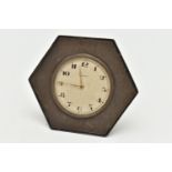 A SILVER 8 DAY BEDSIDE TABLE CLOCK, hexagonal form, engine turned pattern, with a round silvered