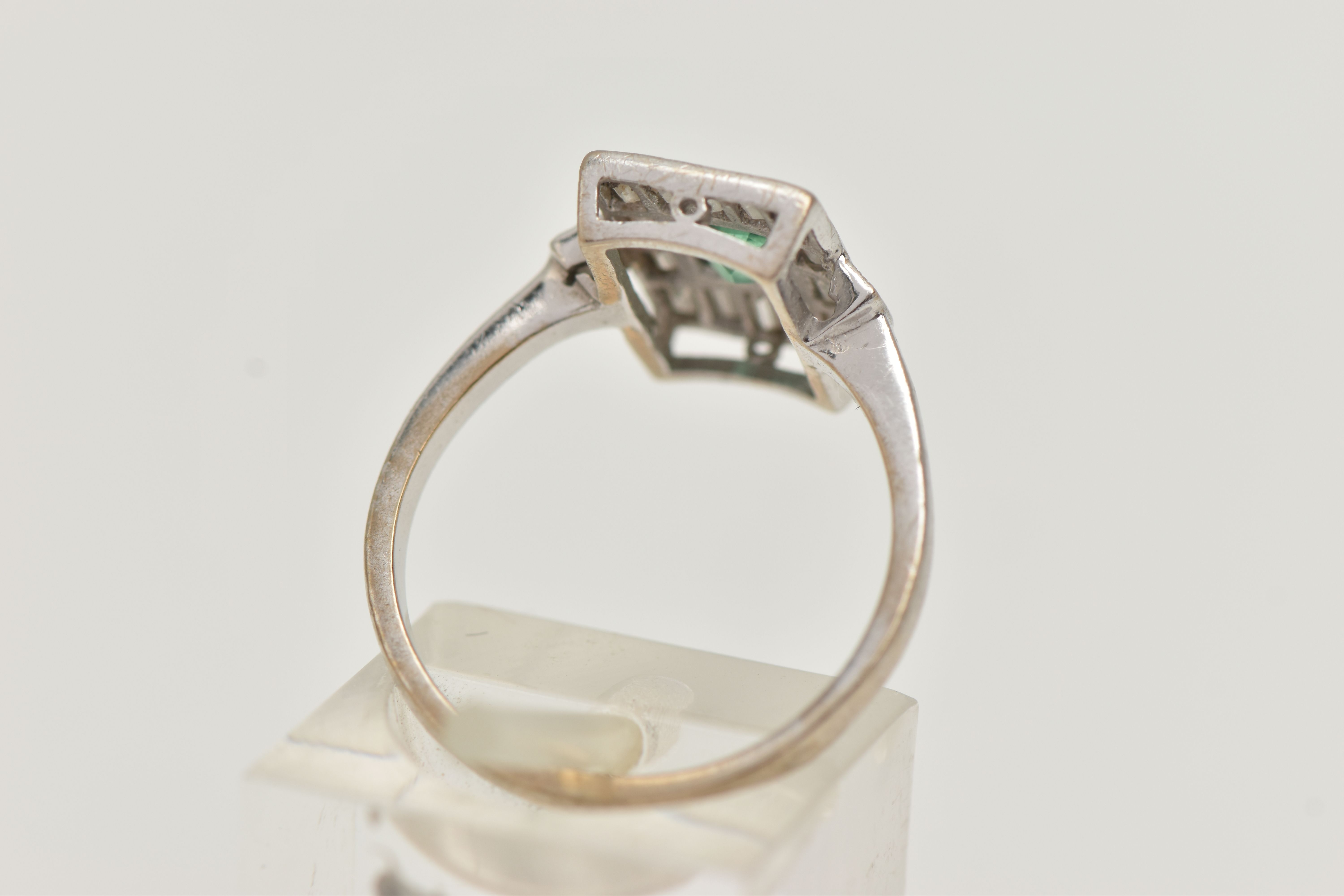 A WHITE METAL EMERALD AND DIAMOND RING, Art Deco style, the centre set with an emerald cut emerald - Image 3 of 4