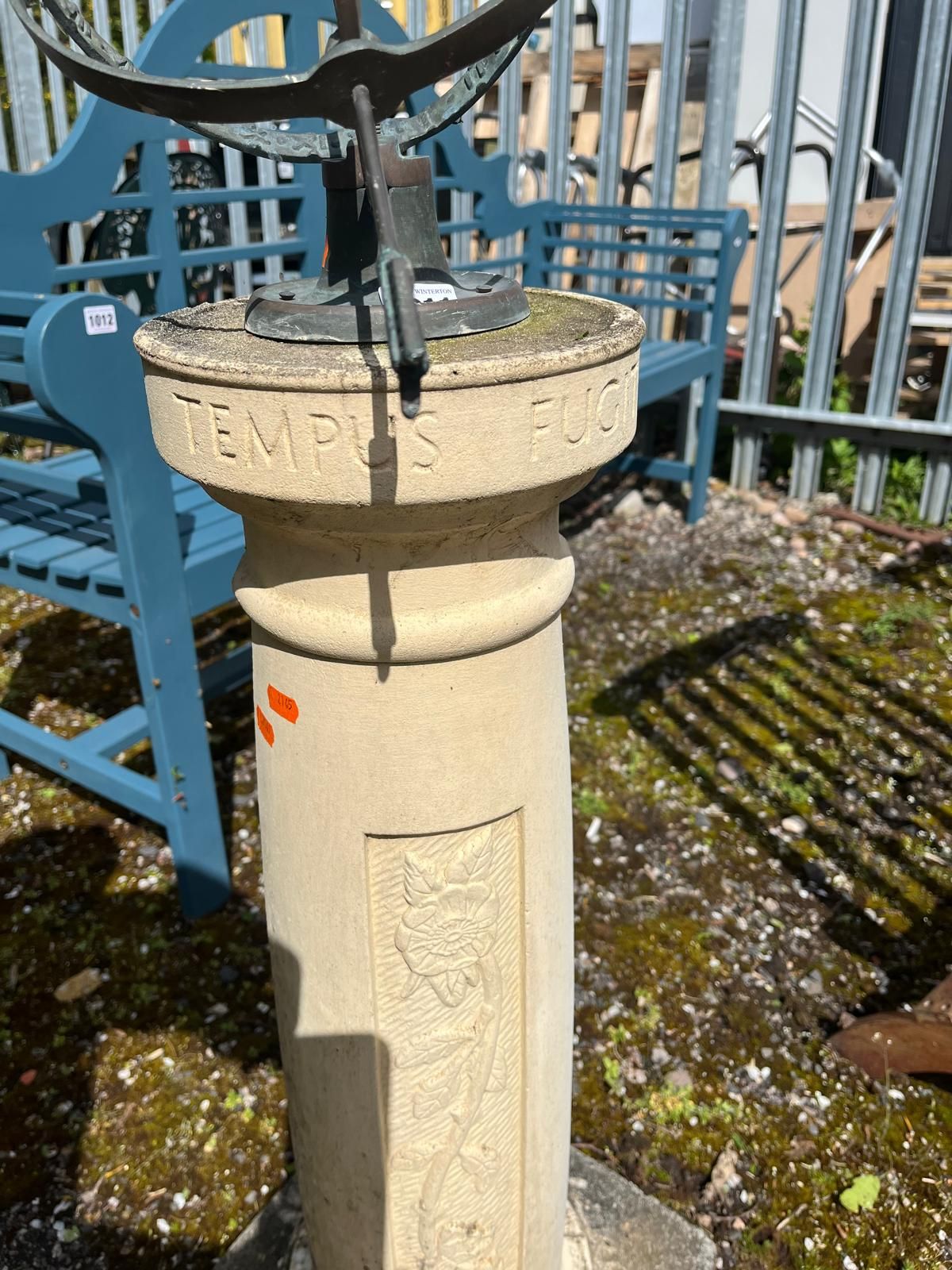 AN ARMILLARY SPHERE BRASS SUNDIAL ON A COMPOSITE COLUMN BASE with foliate panels and 'Tempus - Image 4 of 4