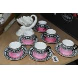 A SET OF SIX EDWARDIAN ROYAL WORCESTER 907 COFFEE CANS AND SAUCERS, featuring a black and white '