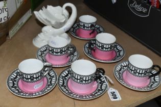 A SET OF SIX EDWARDIAN ROYAL WORCESTER 907 COFFEE CANS AND SAUCERS, featuring a black and white '