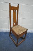 ATTRIBUTED TO WYLIE AND LOCHHEAD, AN ARTS AND CRAFTS OAK CHAIR, the slanted splat back with an