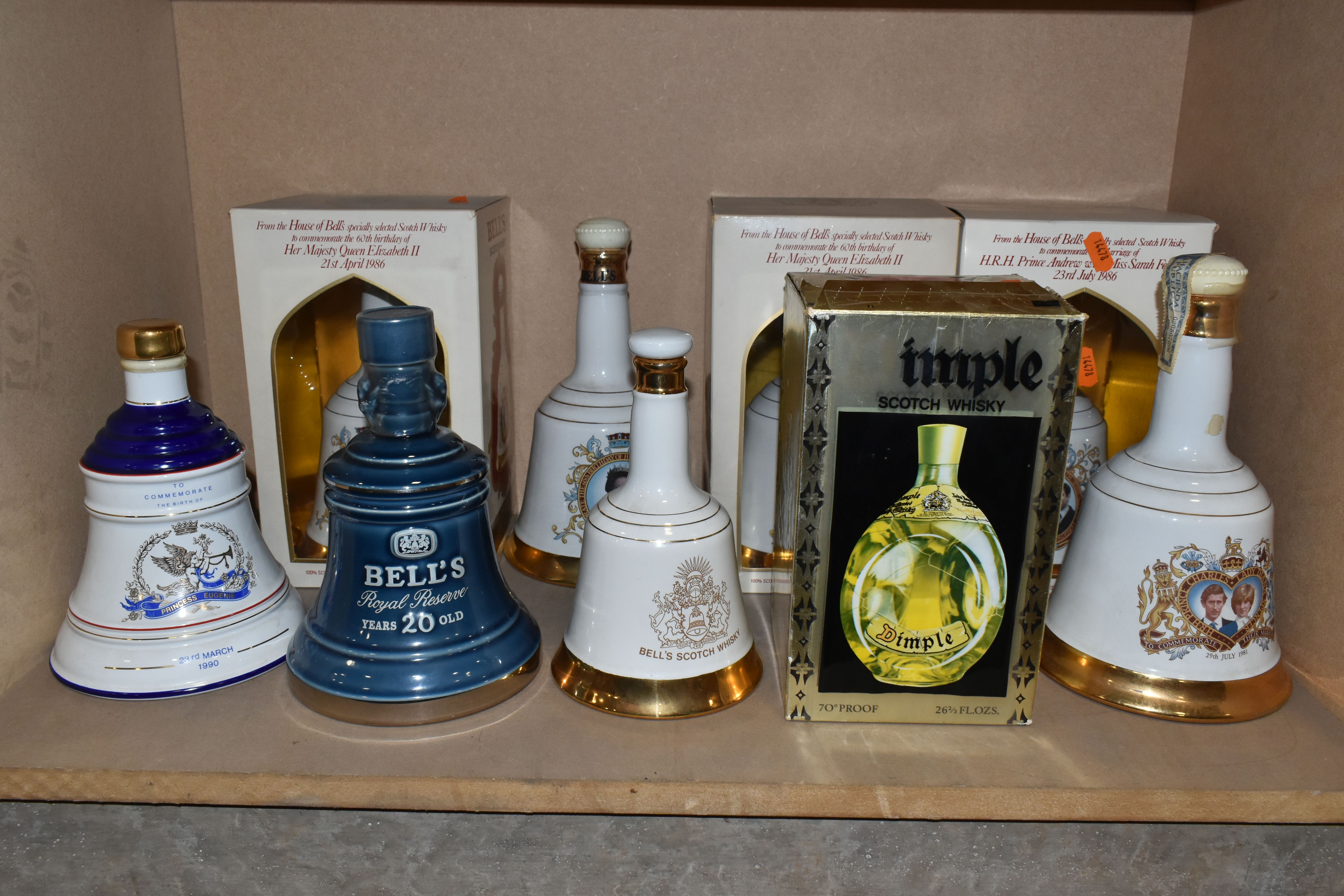 NINE DECANTERS/ BOTTLE OF WHISKY comprising three BELL'S Wade Decanters commemorating the 60th