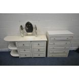 A CREAM DRESSING CHEST, fitted with six drawers and a rounded end, length 150cm x depth 49cm x
