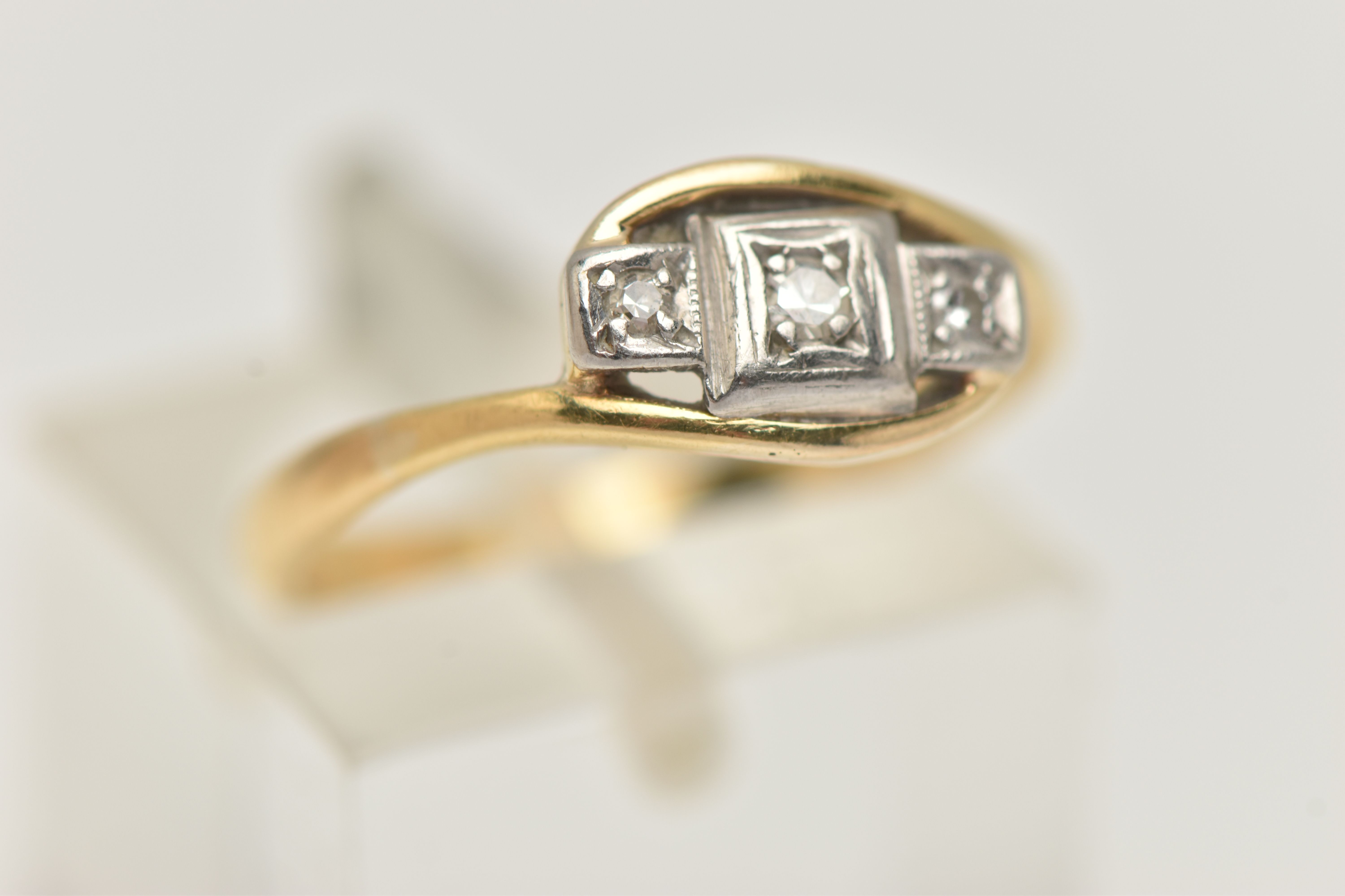 A THREE STONE DIAMOND RING, three single cut diamonds, prong set in white metal, leading on to a - Image 4 of 4