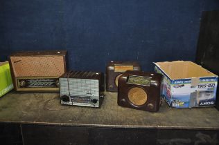 FOUR MID 20th CENTURY VALVE RADIOS comprising of a Bush DAC90A in brown Bakelite case, a similar