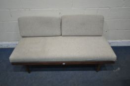 IN THE MANNER OF INGMAR RELLING FOR EKORNES, A NORWEGIAN MID CENTURY TEAK DAYBED, with beige