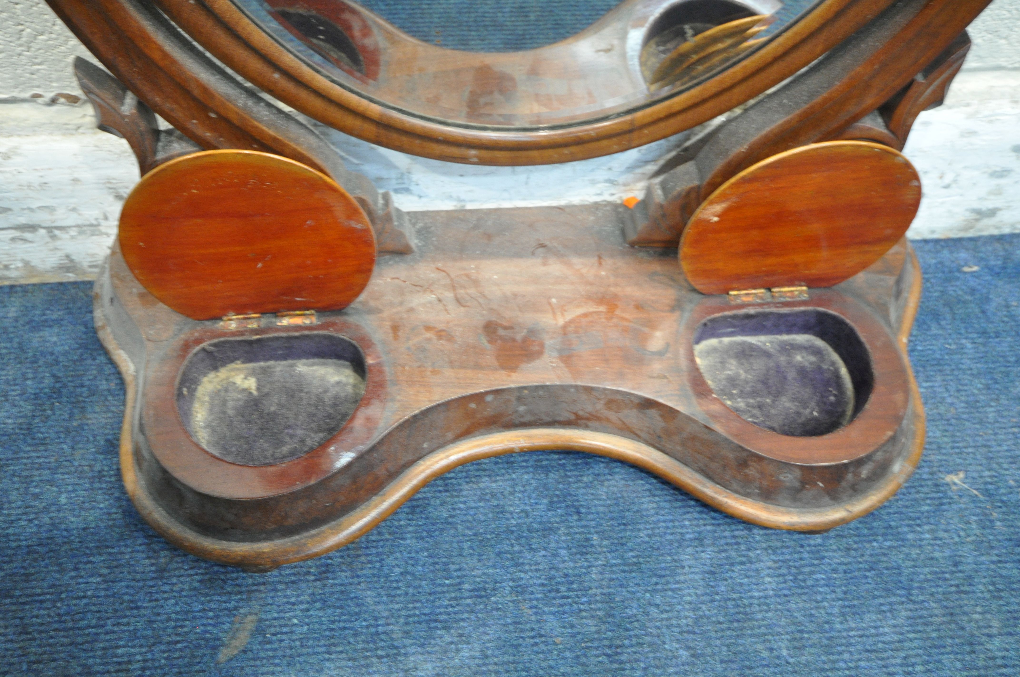 A VICTORIAN MAHOGANY TOILET MIRROR, the oval frame encasing a bevelled mirror plate, scrolled - Image 4 of 6