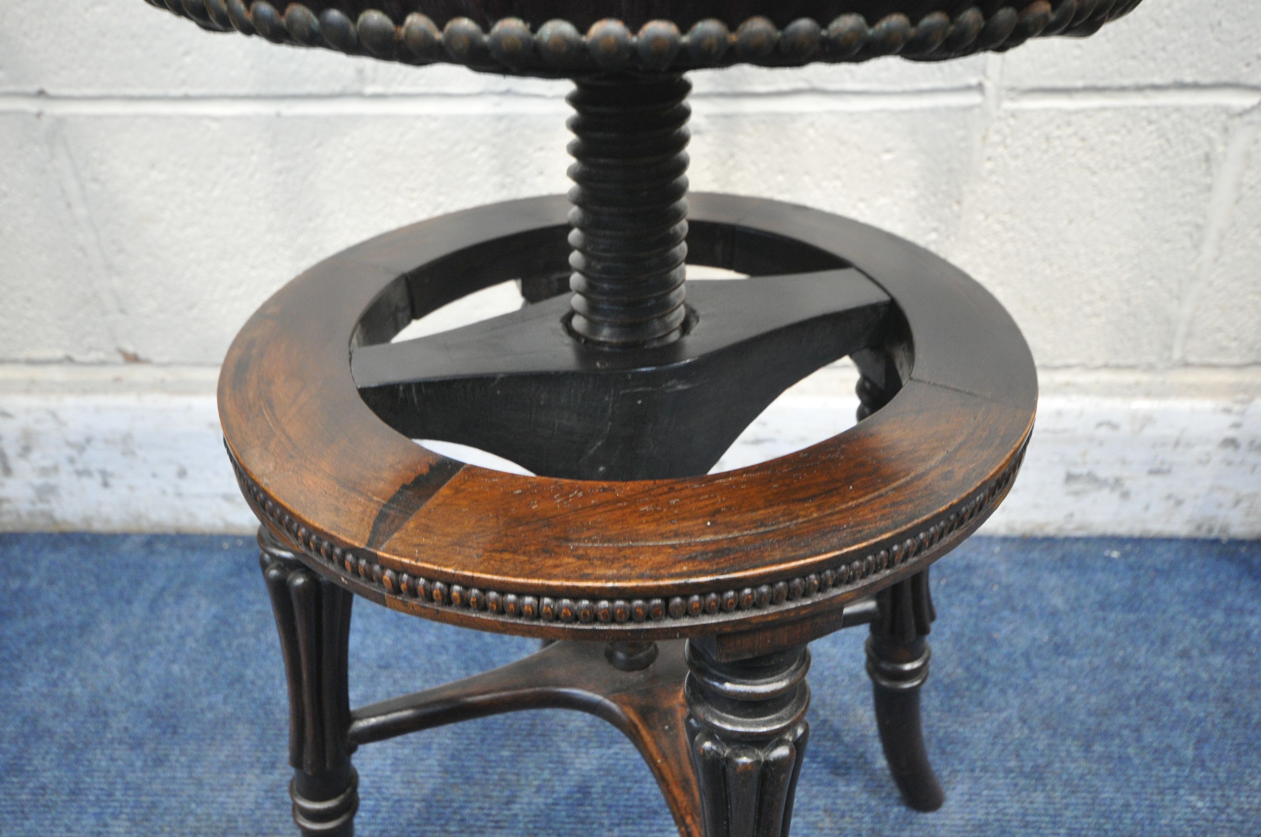 A 19TH CENTURY ROSEWOOD MUSICIAN / HARPIST SWIVEL CHAIR, with scrolled and foliate backrest, oxblood - Image 5 of 7