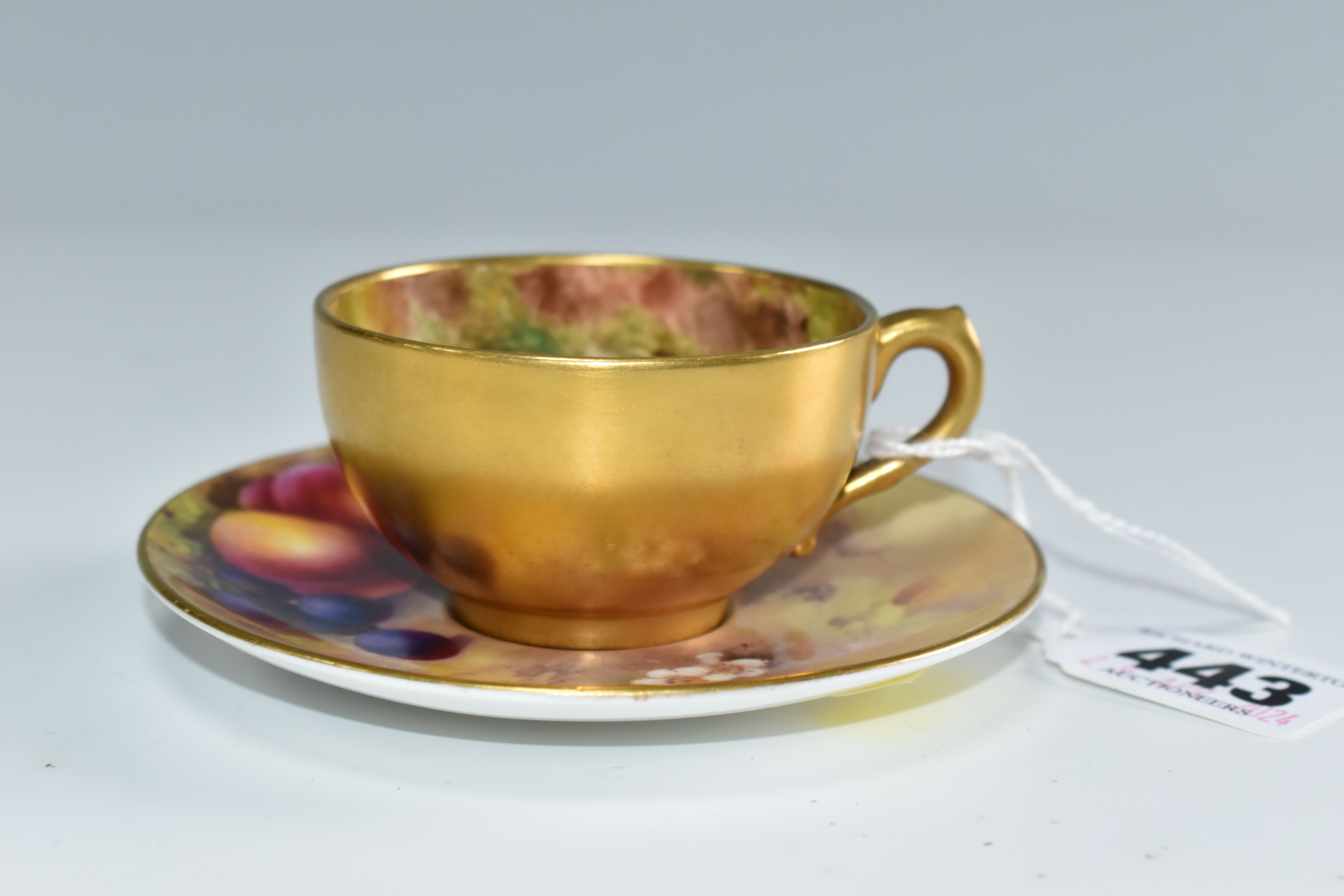 A ROYAL WORCESTER FALLEN FRUITS SMALL TEACUP AND SAUCER, the cup with gilt exterior, interior - Image 2 of 6