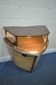 A MID CENTURY COCKTAIL BAR, designed in the shape of a boat front, with simulated rosewood top,