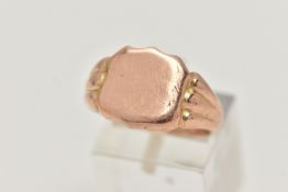 A HEAVY 9CT ROSE GOLD GENTS SIGNET RING, polished shield signet, textured shoulders leading onto a