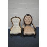 A VICTORIAN WALNUT SPOONBACK ARMCHAIR, with foliate crest and upholstery, open armrests, on front
