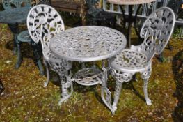 A SILVER PAINTED CAST ALUMINIUM GARDEN TABLE AND A PAIR OF MATCHING CHAIRS with pierced foliate