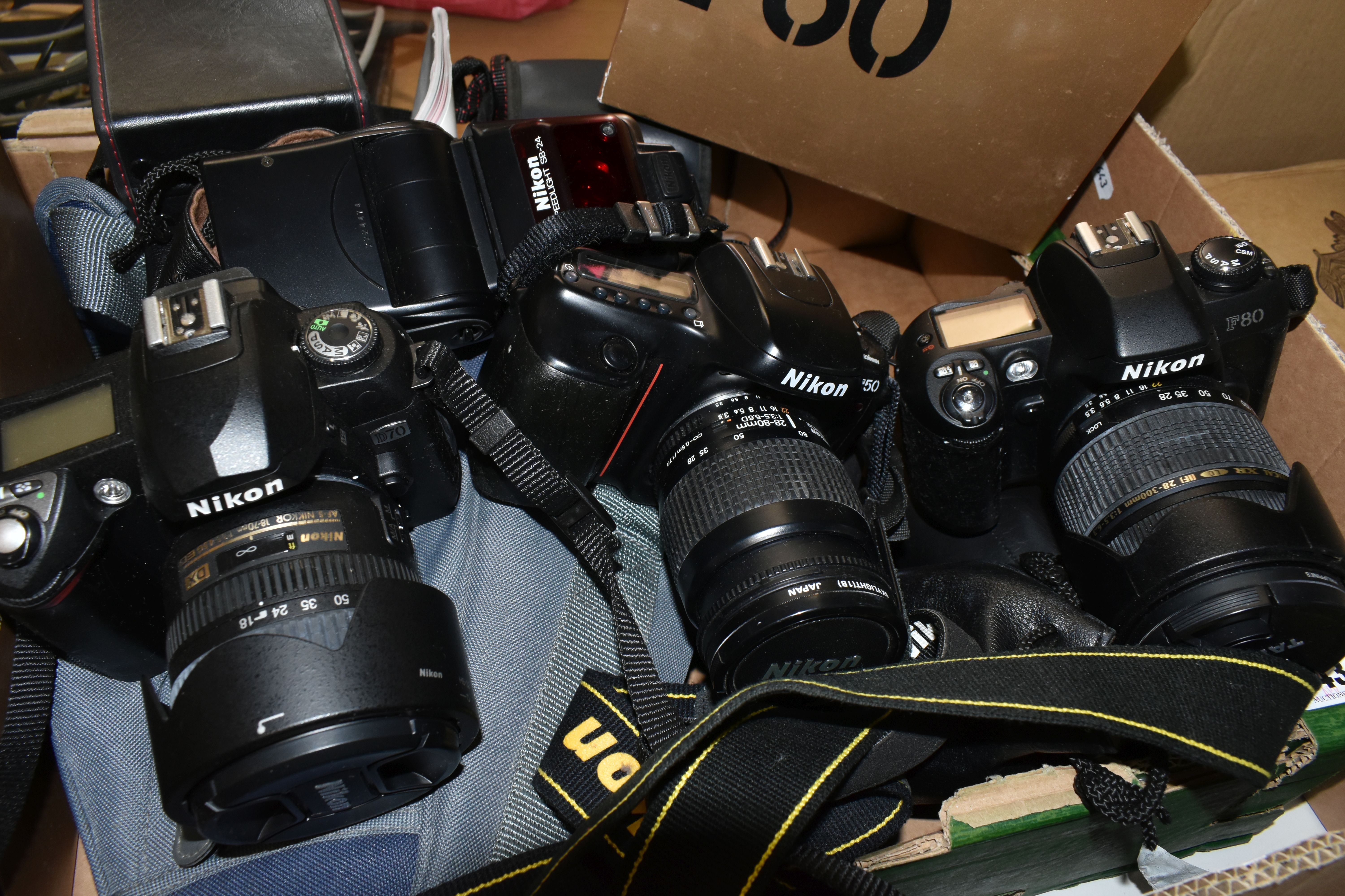 A BOX OF NIKON CAMERAS AND LENSES, to include a Nikon F80 35mm camera fitted with a Tamron f3.5-6. - Image 2 of 3