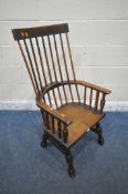 A 19TH CENTURY AND LATER PRIMITIVE STYLE COMB BACK ARMCHAIR, with bentwood armrests, turned