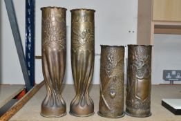 TWO PAIRS OF TRENCH ART VASES, one pair have been twisted at the base and decorated with a rose