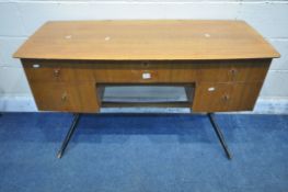 WRIGHTON, A MID CENTURY TOLA AND BLACK DESK, fitted with five drawers, raised on splayed legs,