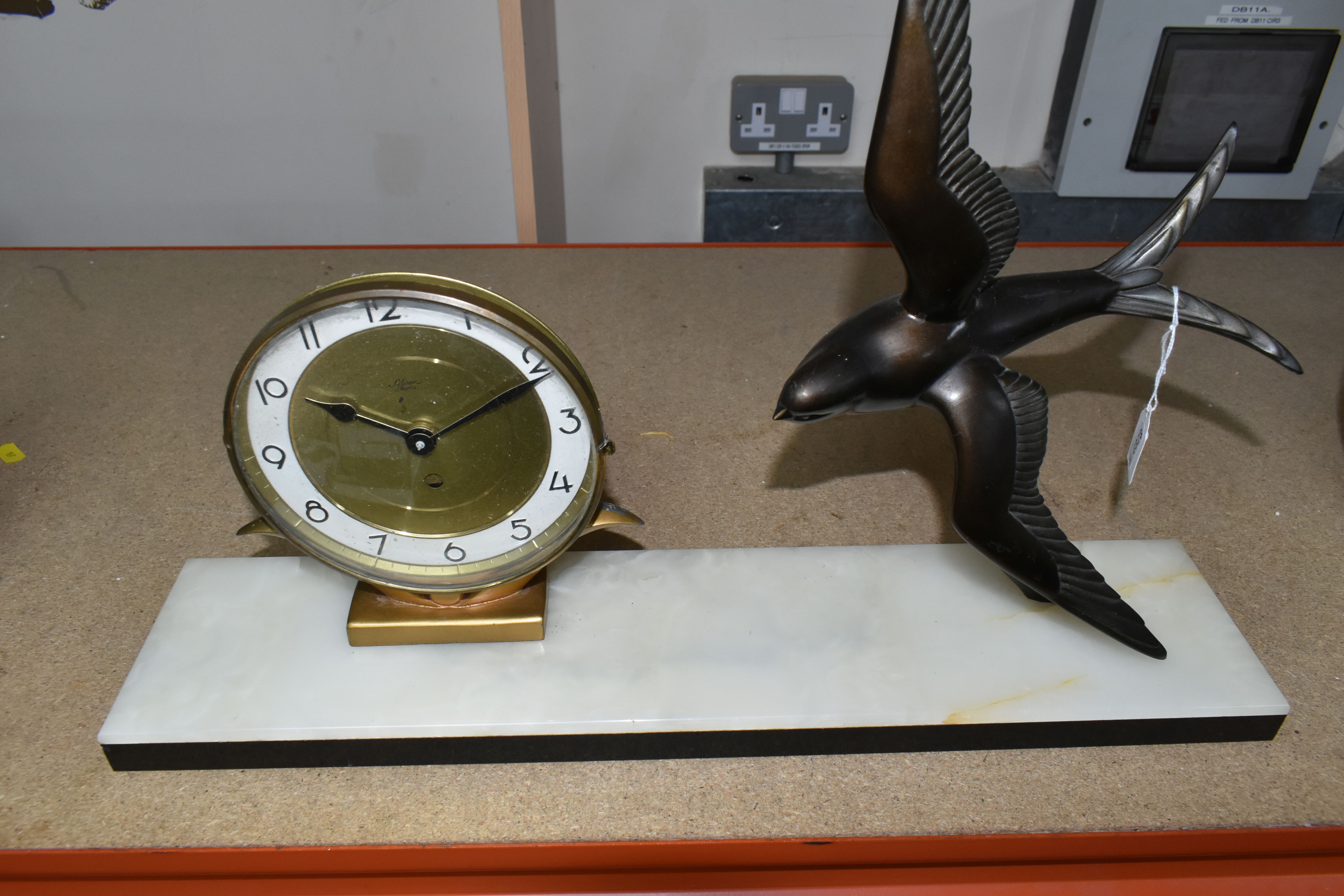 A FRENCH ART DECO MANTEL CLOCK, by Sivoz - Paris, supported by a marble plinth with a bronzed - Image 6 of 6