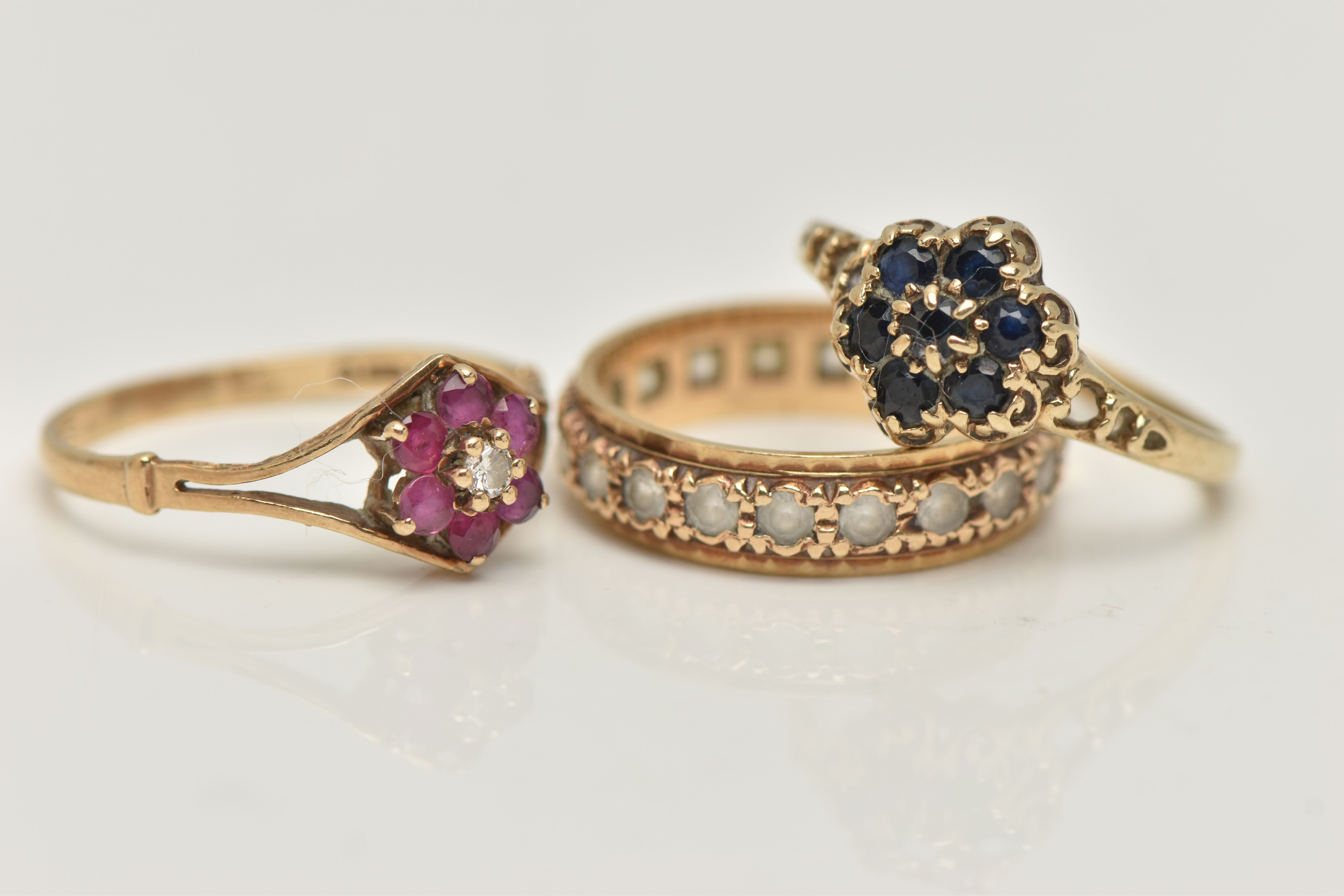 THREE GEM SET RINGS, the first a sapphire floral cluster, hallmarked 9ct London, ring size N, the - Image 2 of 4