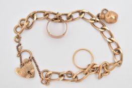 A 9CT GOLD CHARM BRACELET, a curb link bracelet fitted with a heart padlock clasp, hallmarked 9ct