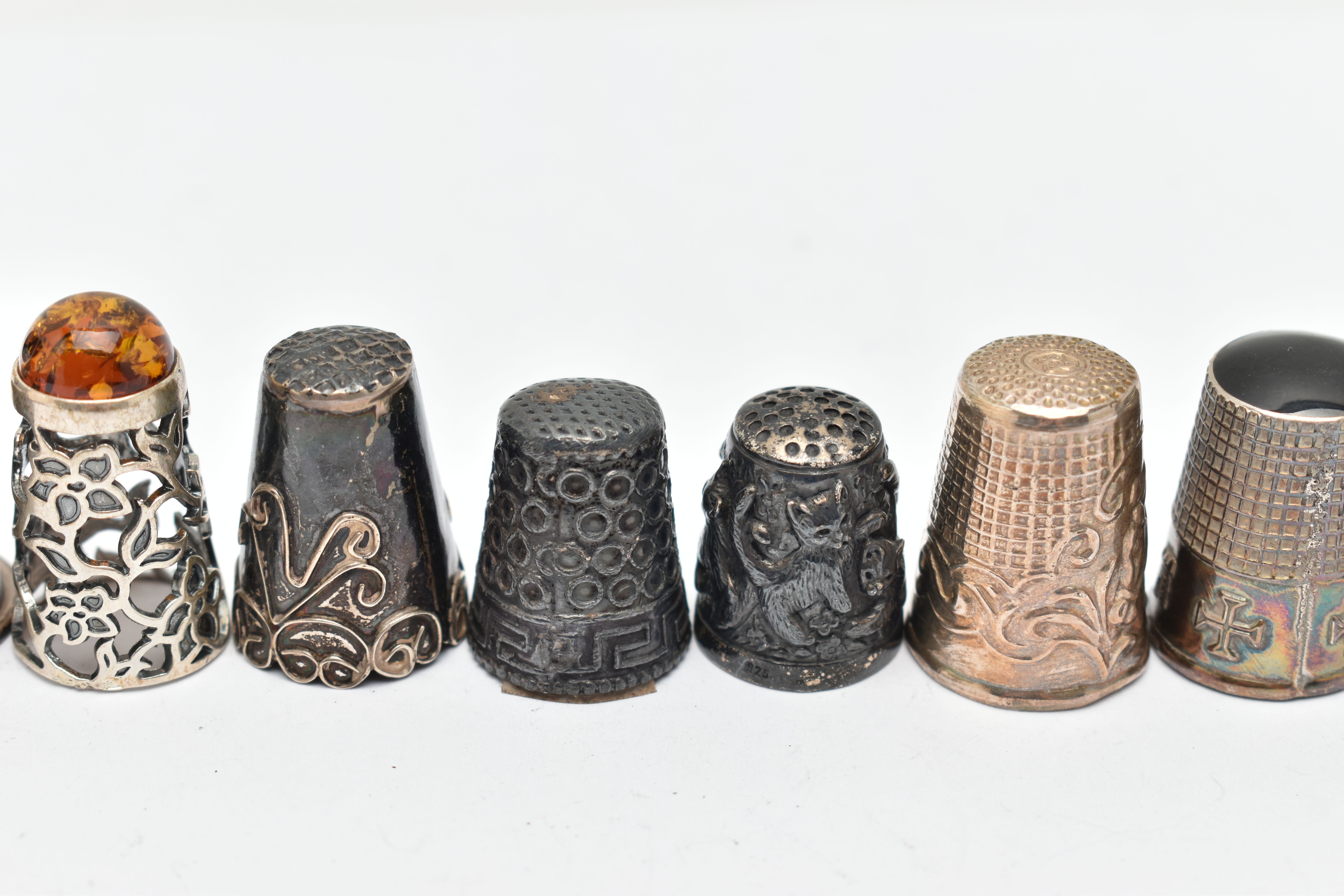 A BAG OF WHITE METAL THIMBLES, various designs and patterns, some set with semi-precious stone - Image 9 of 10