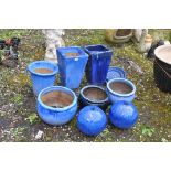 ELEVEN BLUE GLAZED GARDEN POTS and orbs the largest being 38cm high