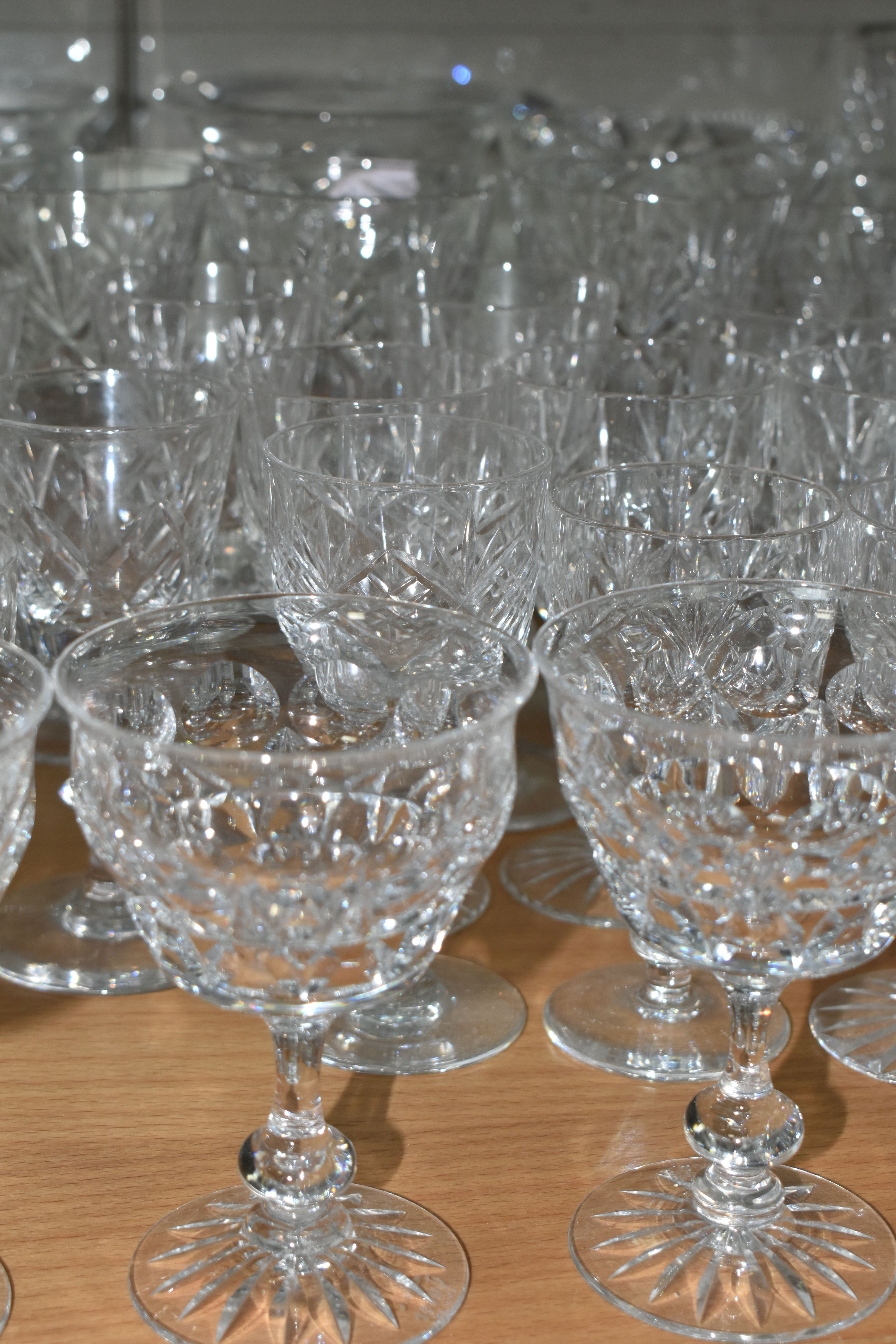 A LARGE QUANTITY OF CUT CRYSTAL WINE GLASSES AND WHISKY TUMBLERS, maker's names include Tudor - Image 5 of 6