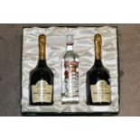 A BOXED PRESENTATION COLLECTION from Gilbey Vintners comprising two bottles of the superb TAITTINGER