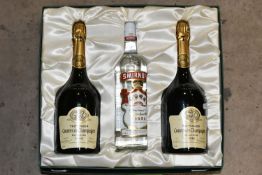 A BOXED PRESENTATION COLLECTION from Gilbey Vintners comprising two bottles of the superb TAITTINGER