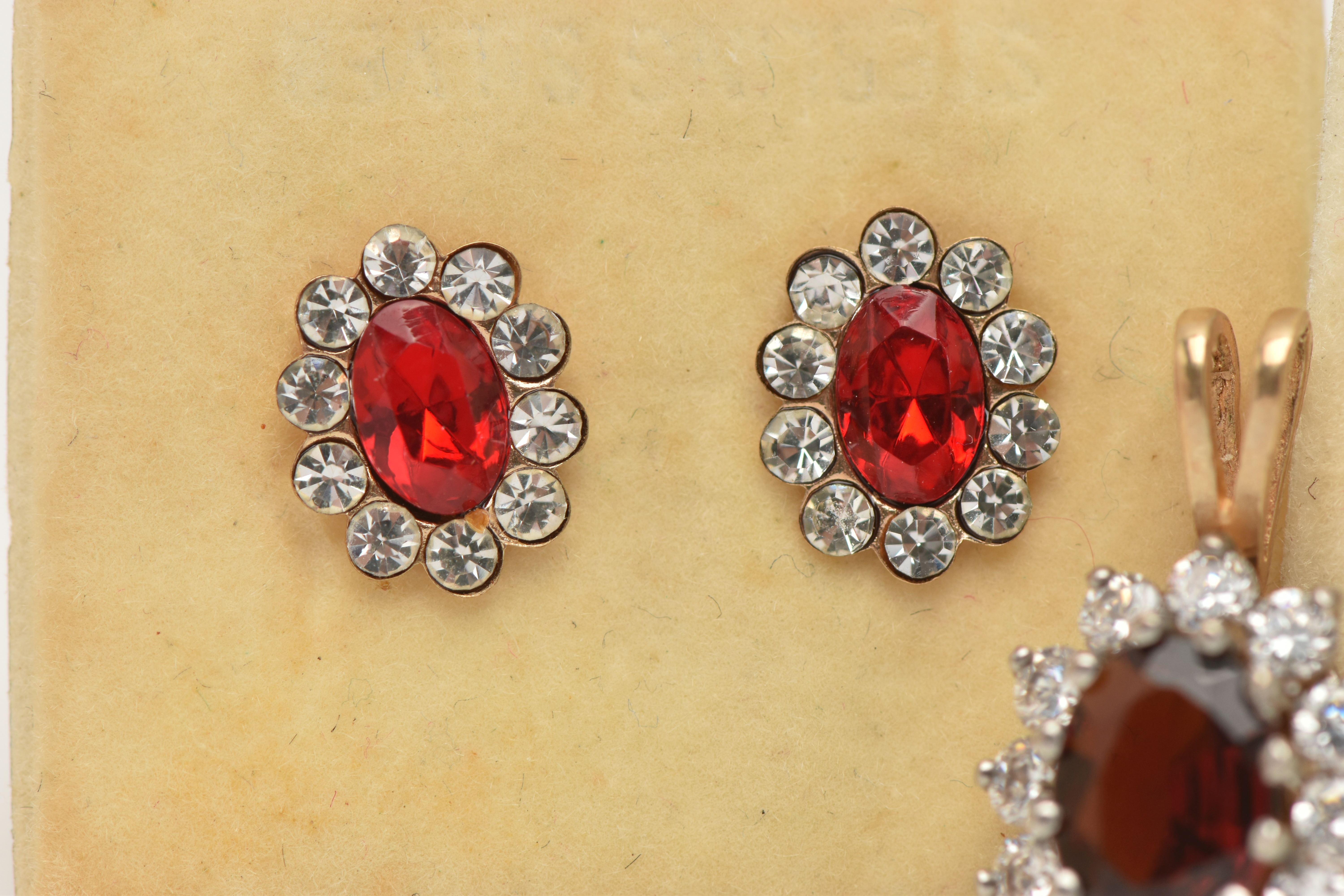 TWO PAIRS OF EARRINGS AND A PENDANT, the 9ct gold cluster pendant with central oval red gem assessed - Image 2 of 4