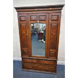 A LATE 20TH CENTURY PINE WARDROBE, with a single bevelled mirror door, above three drawers, width