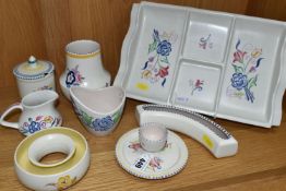 EIGHT PIECES OF POOLE POTTERY, all with floral decoration, including an hors oeuvres dish, an eggcup