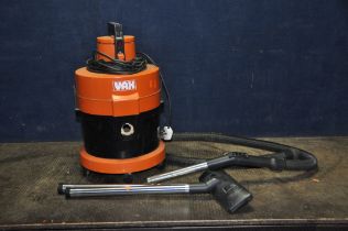 A VAX MODEL 121 VACUUM CLEANER with pipework and floor head (PAT pass and working)