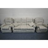 A BEIGE AND FOLIATE THREE PIECE LOUNGE SUITE, comprising a three seater sofa, length 173cm x depth