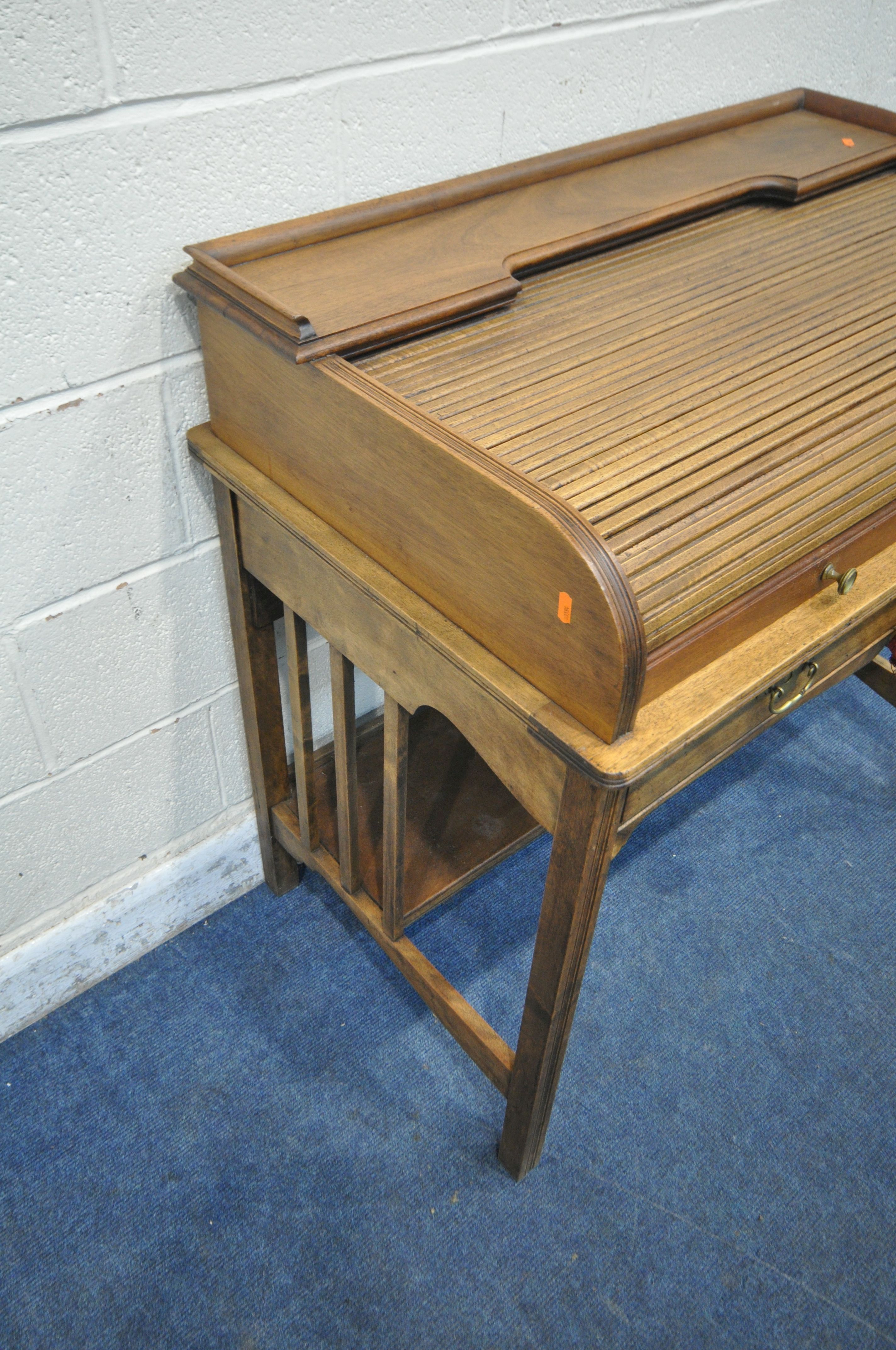 ANGUS OF LONDON, AN EARLY 20TH CENTURY WALNUT ROLL TOP DESK, with a raised shelf, the tambour door - Image 2 of 7