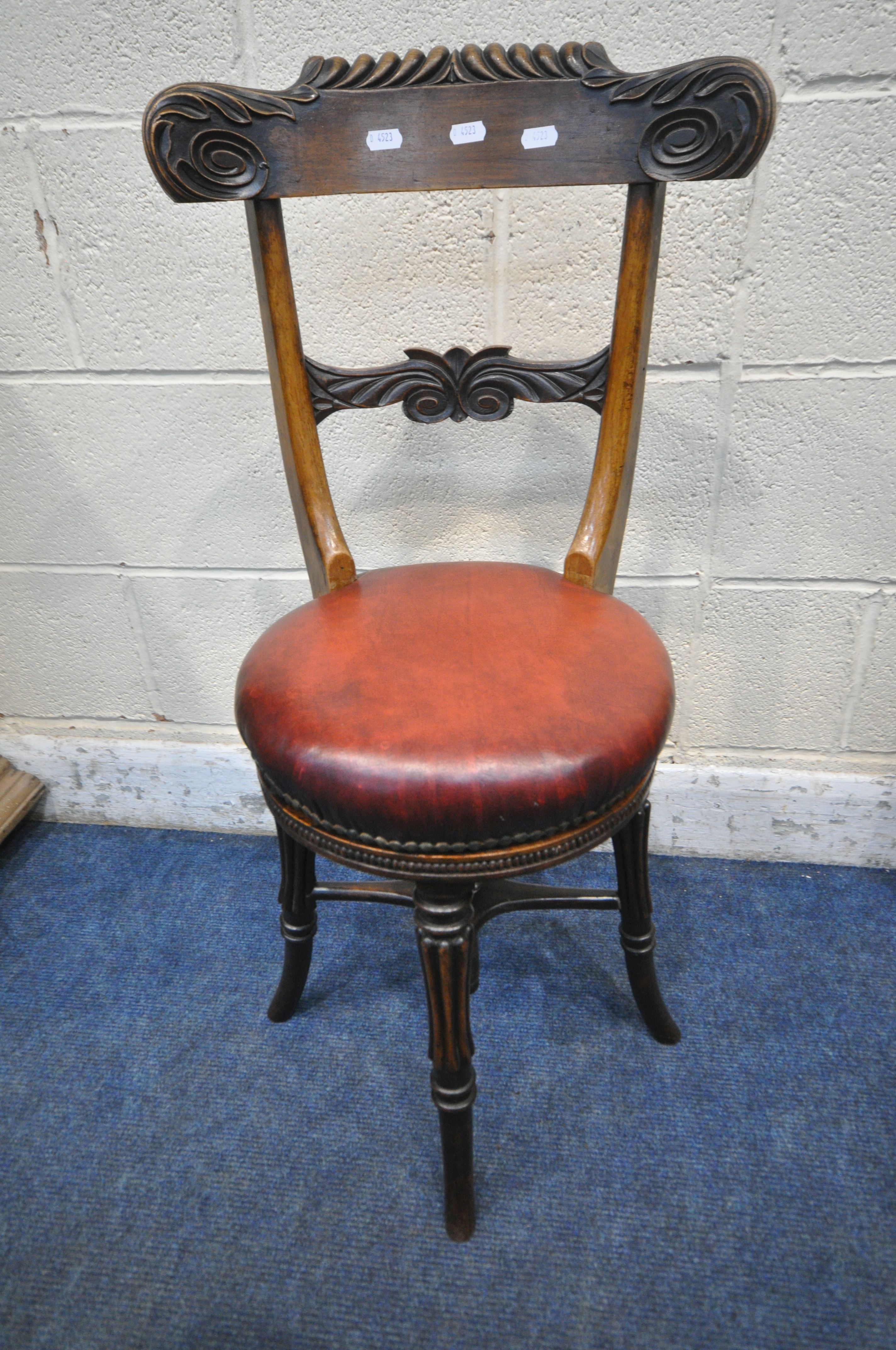 A 19TH CENTURY ROSEWOOD MUSICIAN / HARPIST SWIVEL CHAIR, with scrolled and foliate backrest, oxblood - Image 7 of 7